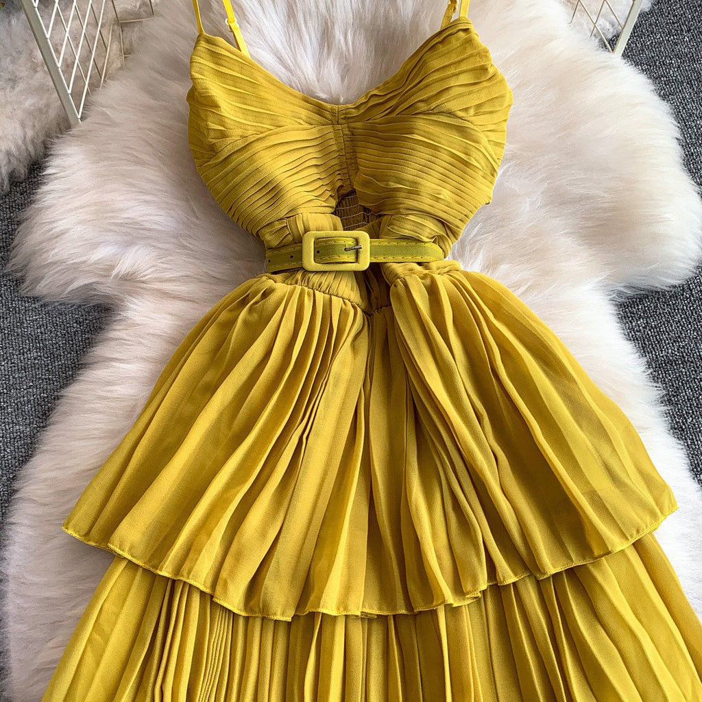 Yellow pleated midi dress with belt