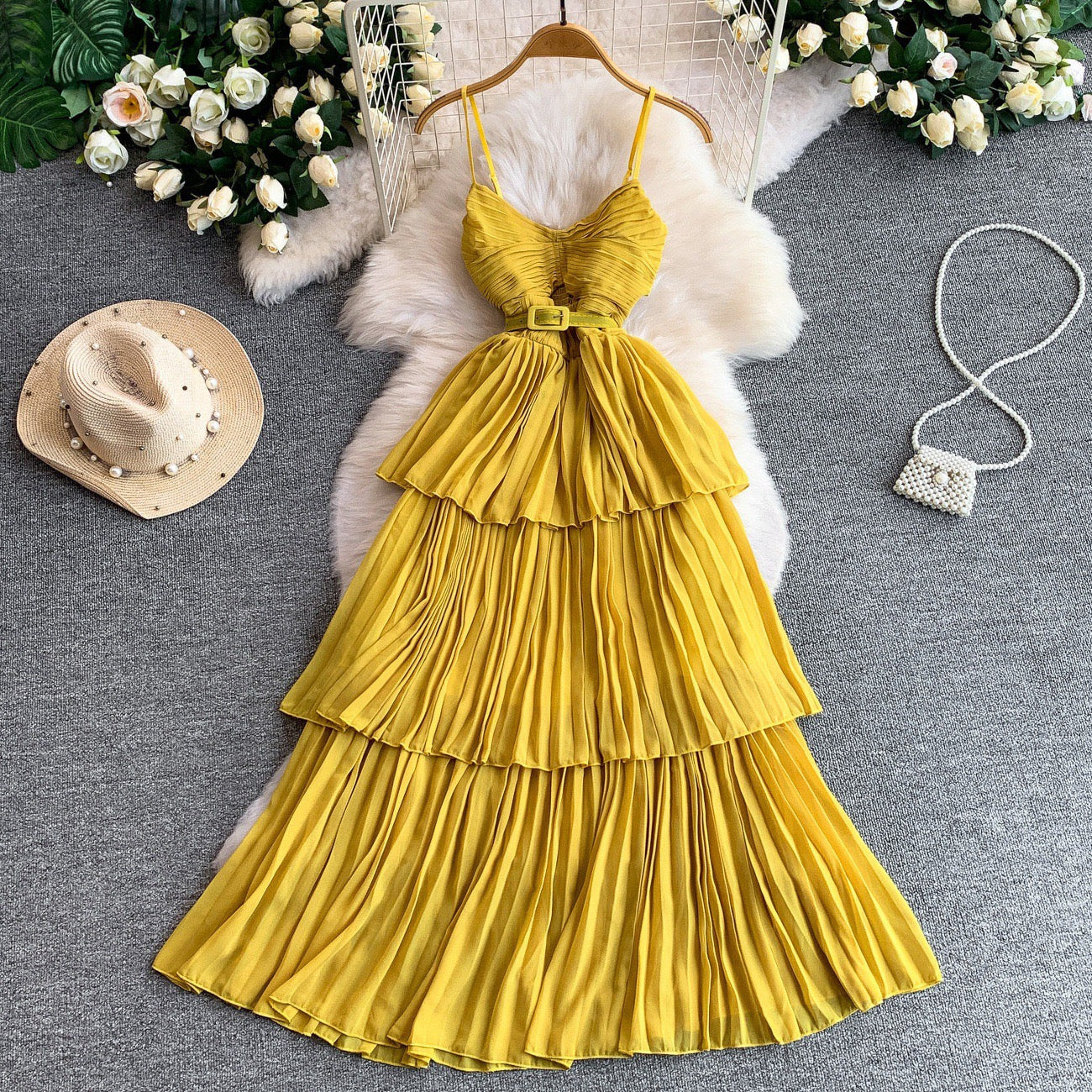 Yellow pleated midi dress with belt